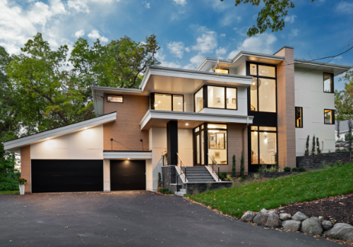 Front of a white, modern house.
